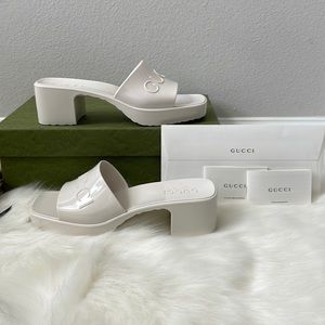 100 percent authentic Gucci rubber slides in mystic white